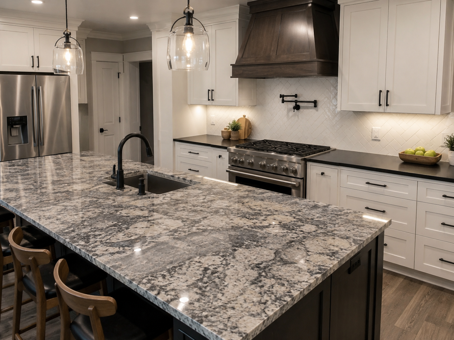 Mason Ohio dramatic granite kitchen island countertop with black sink and faucet